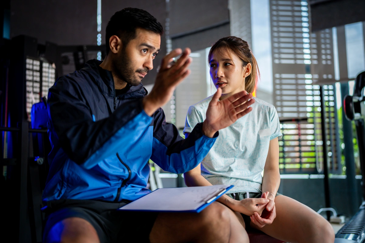 asian-man-and-woman-working-out-one-is-a-trainer-2024-09-25-05-04-47-utc(1)